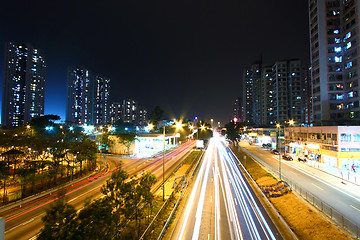 Image showing Modern city and traffic at night