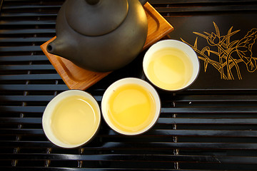 Image showing Chinese tea set with tea pots