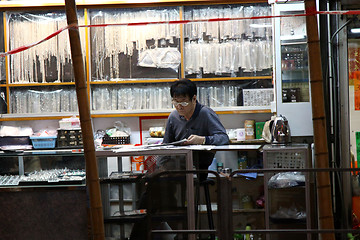 Image showing Shopkeeper in Hong Kong