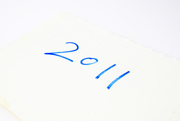 Image showing 2011 words on paper