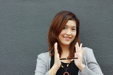 Image showing Asian woman with an idea