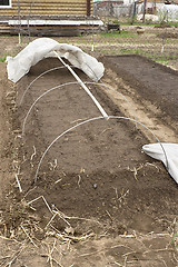 Image showing Frame from the wire to cover the beds