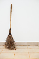 Image showing Broom near a white wall