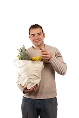 Image showing Man Holding Grocery Items