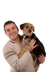 Image showing Guy Holding a Cute Dog