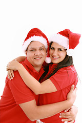 Image showing Happy christmas couple. Isolated over white background. 