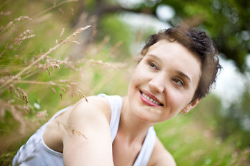 Image showing girl on green field 