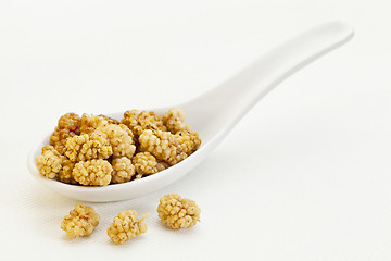 Image showing spoon of dried white mulberries