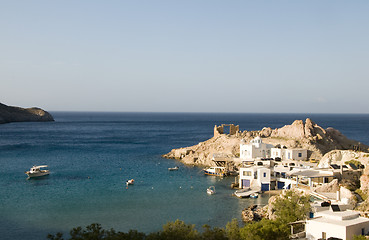 Image showing houses built into rock cliffs on Mediterranean Sea Firopotamos M