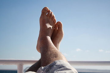 Image showing feet high on the yacht