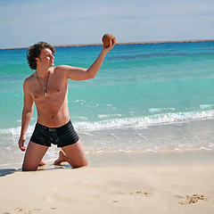 Image showing Man posing with the coconut in hand