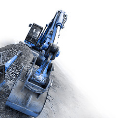 Image showing backhoe digging small stones