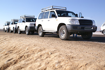 Image showing white jeeps