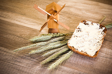 Image showing Still life with bread and spikes