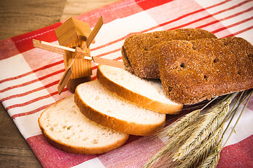 Image showing Still life with bread and spikes