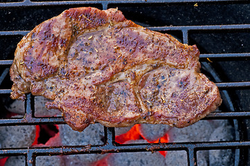 Image showing roasted pork neck on barbecue