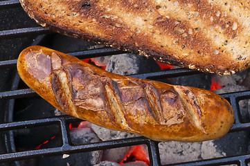 Image showing roasted sausage on barbecue