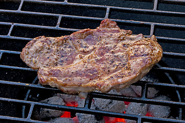 Image showing roasted pork neck on barbecue