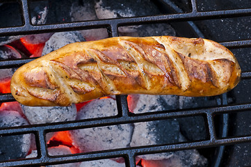 Image showing roasted sausage on barbecue