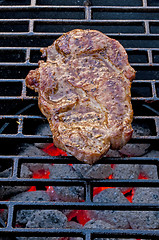 Image showing roasted pork neck on barbecue