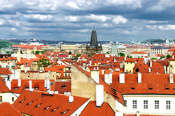 Image showing Prague roofs and cloudy sky