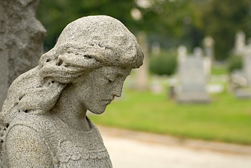 Image showing Granite statue of angelic woman at a gravesite