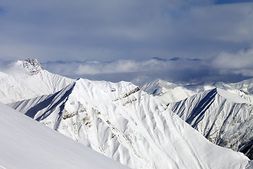 Image showing Ski slope and snowy mountains