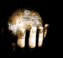 Image showing Globe in a girl's hands