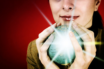 Image showing Globe in a girl's hands