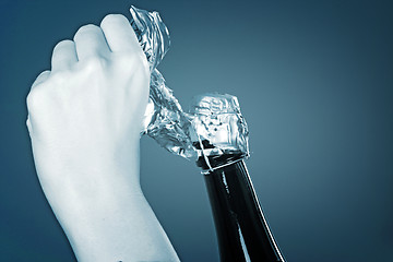 Image showing Opening champagne bottle