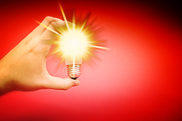 Image showing Background with lit lightbulb