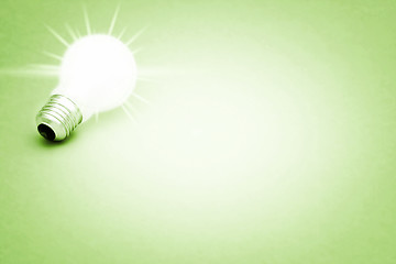 Image showing Background with lit lightbulb