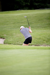 Image showing woman is playing golf on course  summer