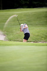 Image showing woman is playing golf on course  summer