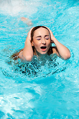 Image showing beautiful woman in summer in pool swimming 