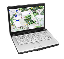 Image showing Open laptop with money 