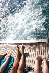 Image showing people sunning themselves on deck