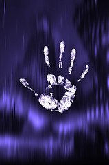 Image showing handprint,blue light background
