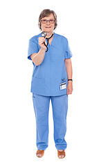 Image showing Senior lady doctor posing with stethoscope