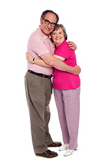 Image showing Happy aged woman hugging her husband