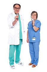 Image showing Medical team of doctors holding stethoscope