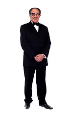 Image showing Attractive senior man posing in tuxedo