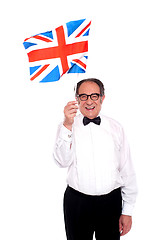 Image showing Man cheering for United Kingdom. Waving flag