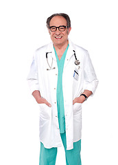 Image showing Aged surgeon with hand in pocket