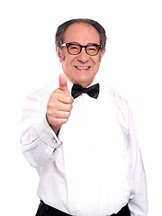 Image showing Smiling old man gesturing thumbs up