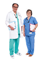 Image showing Senior male doctor posing with female nurse