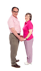 Image showing Happy matured couple in love holding hands