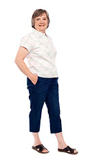 Image showing Old lady posing with hands in pocket