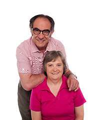 Image showing Lovely family posing for a photo shot, in studio