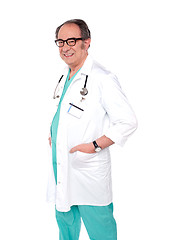 Image showing Smiling aged doctor posing in style